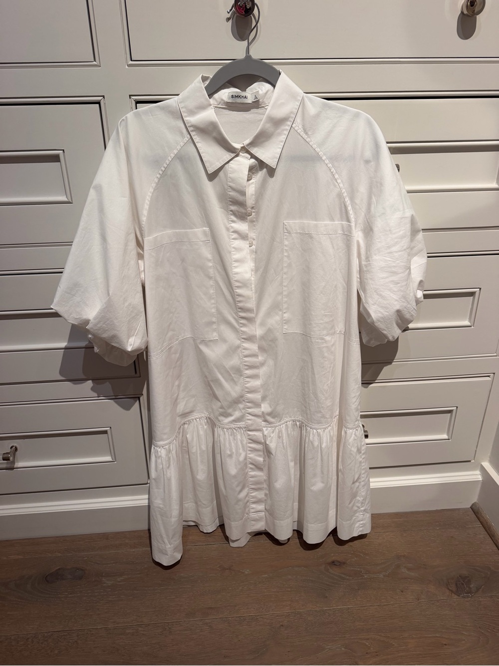 Relaxed White Collared Mini Dress with Peplum Hem